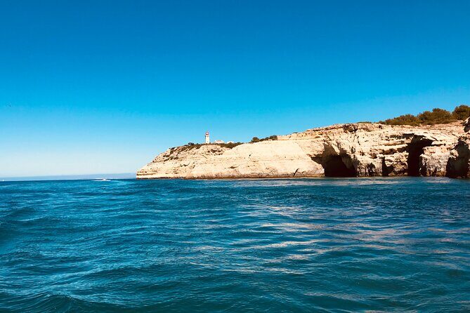 Algarve Coast Guided Boat Tour - Leaving Portimão: Churches, Ferragudo Castle, and River-to-Sea Changeover
