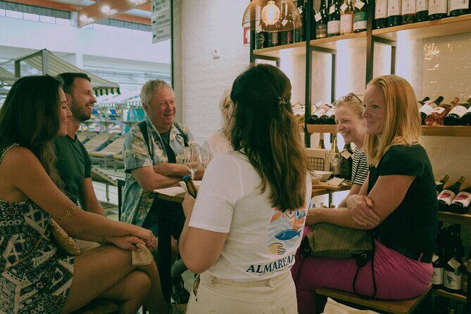 Authentic Market & Food Tour in Portimão, Algarve - Entering the Mercado Municipal de Portimão for fish, fruit, and pastries