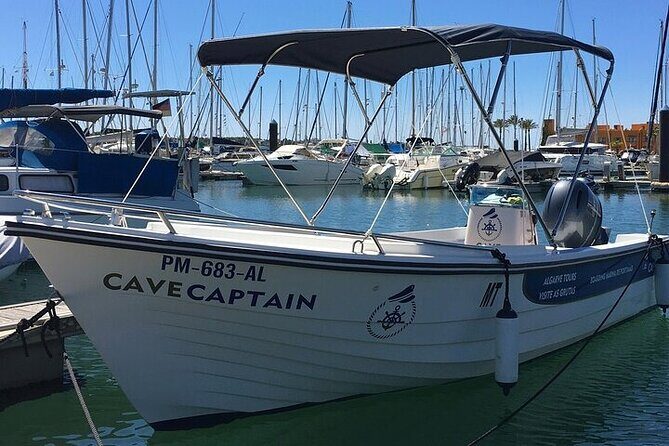 Benagil - Caves & Coast - Algarve Cave Captain - The small boat difference near the caves