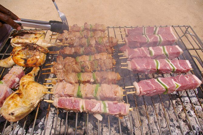 Full day trip with BBQ on the beach, Caves, Sailing - Beach time and BBQ: the meal is the point