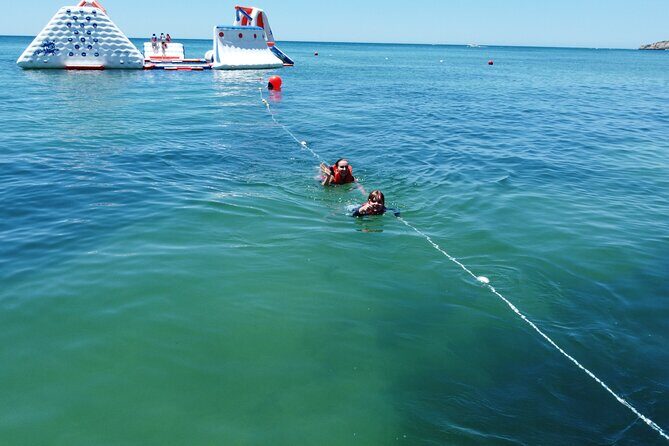 Inflatable Waterpark Entry Ticket at Armação de Pêra - The 7-Element Ocean Course: Slides, Swims, and Big Moments