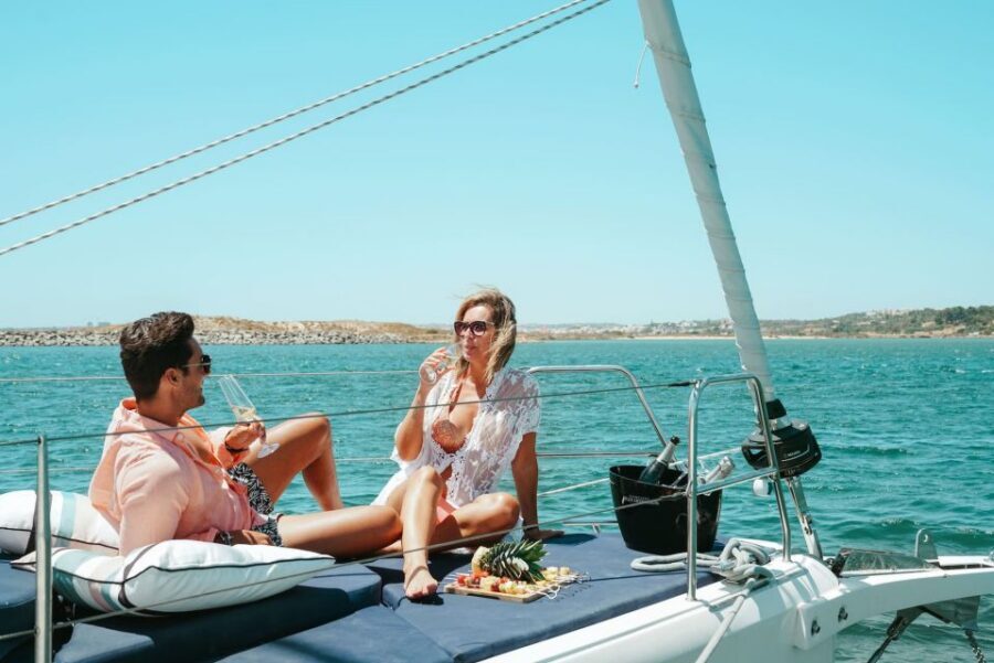 Portimao: Full Day Luxury Sail-Yacht Cruise - Swim stops and the included paddle boards
