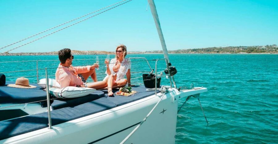 Portimao: Half-Day Sailing Yacht Cruise to the Benagil Caves - Sailing the Algarve Coast: Golden Cliffs, Hidden Beaches, and Sea-Level Views