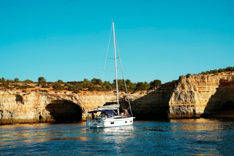 Portimao: Half-Day Sailing Yacht Cruise to the Benagil Caves - Benagil Stops and Swim Time: Getting Your Feet Wet (Literally)