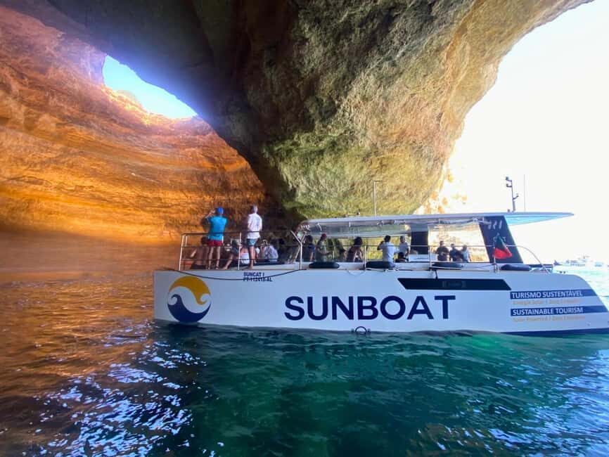 Portimao: Summer SUNSET Benagil Caves Tour | Eco Catamaran - Cruising the Algarve Golden Coast: Comfort Meets Ocean Air